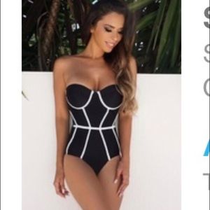 Black and white strapless one piece.
